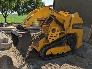 BaumaLight TRL620D stand on compact mini loader