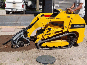 BaumaLight TRL620D stand on compact mini loader