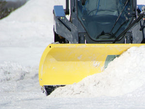 SnowWolf Ultra snow plows with trip edge for skid steer loaders