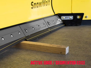 SnowWolf Ultra snow plows with trip edge for skid steer loaders