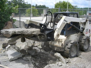 OMNI ATTACHMENTS The Beak concrete grapple for skid steer loaders