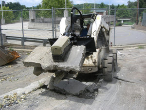 OMNI ATTACHMENTS The Beak concrete grapple for skid steer loaders