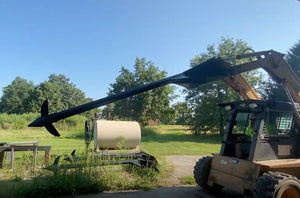 Omni Attachments demo pole for skid steer