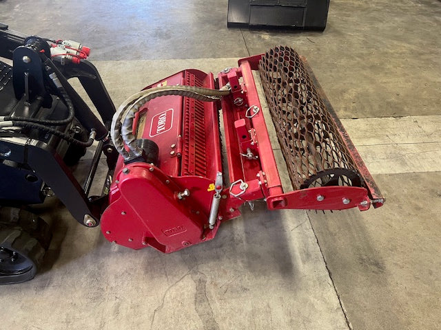 Used TORO soil cultivator for mini loader