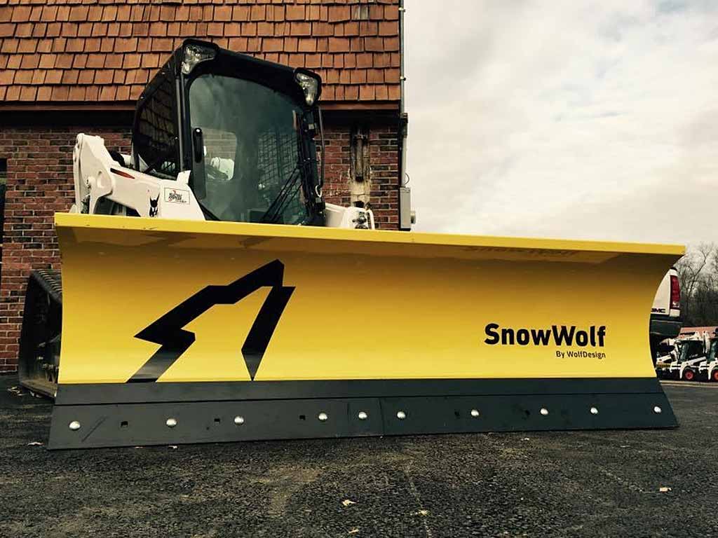 SnowWolf Ultra snow plows with trip edge for skid steer loaders